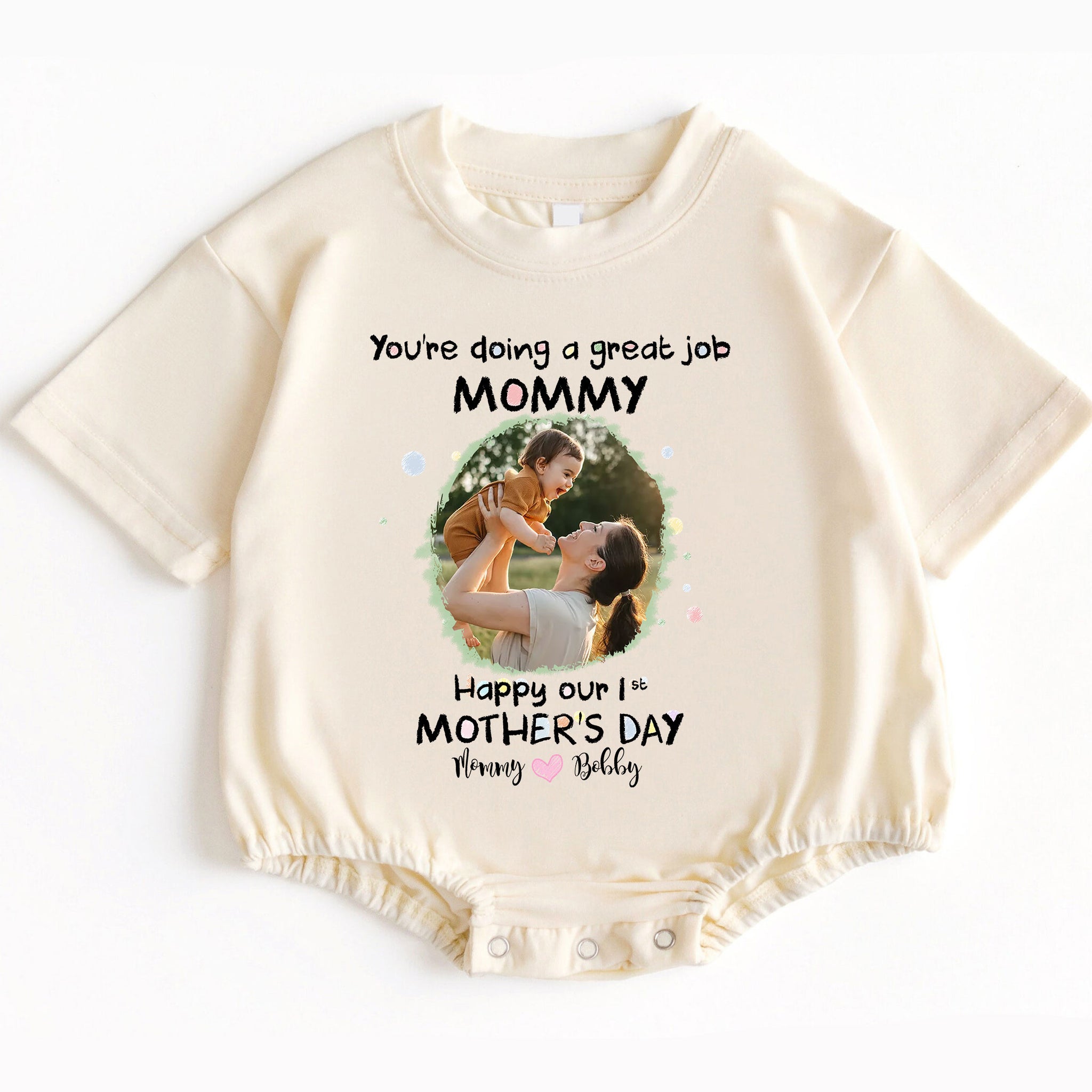 Make her first Mother's Day truly special with the "You're Doing A Great Job Mommy - Happy First Mother's Day" Romper Baby Bodysuit. Order yours today and give the gift of love, comfort, and a cherished memory!