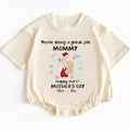 Give the new mom in your life a gift that's both incredibly cute and deeply meaningful. Celebrate her strength, love, and dedication this 1st Mother's Day with this special 'You're Doing A Great Job Mommy' baby bodysuit!