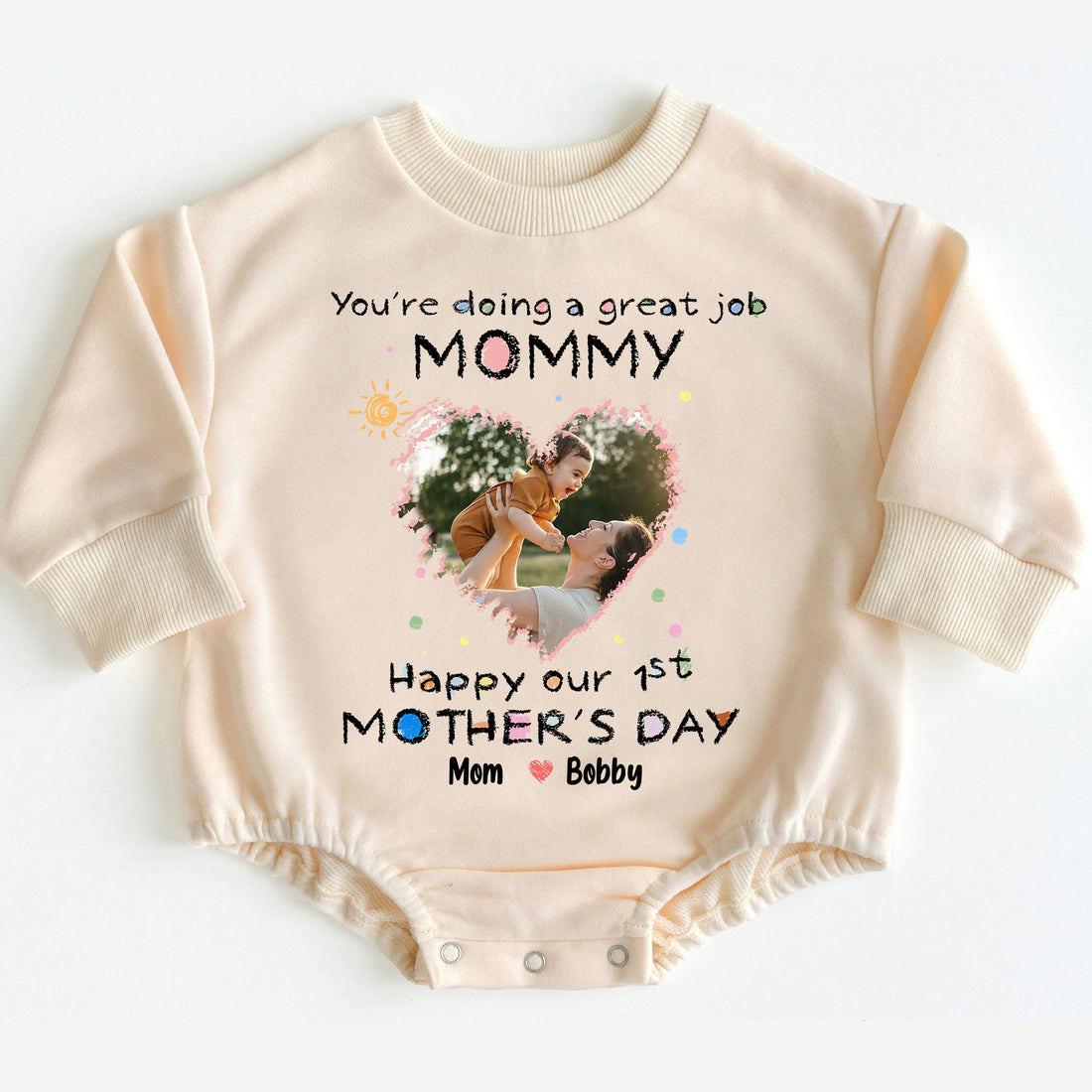 Make her first Mother's Day truly extraordinary and memorable with the "You're Doing A Great Job Mommy - Happy Our First Mother's Day" Romper Baby Bodysuit. Order yours today and give the gift of love, comfort, and a cherished memory!
